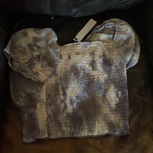 So the brand is papermoon and this shirt is to small for me so I am passing it